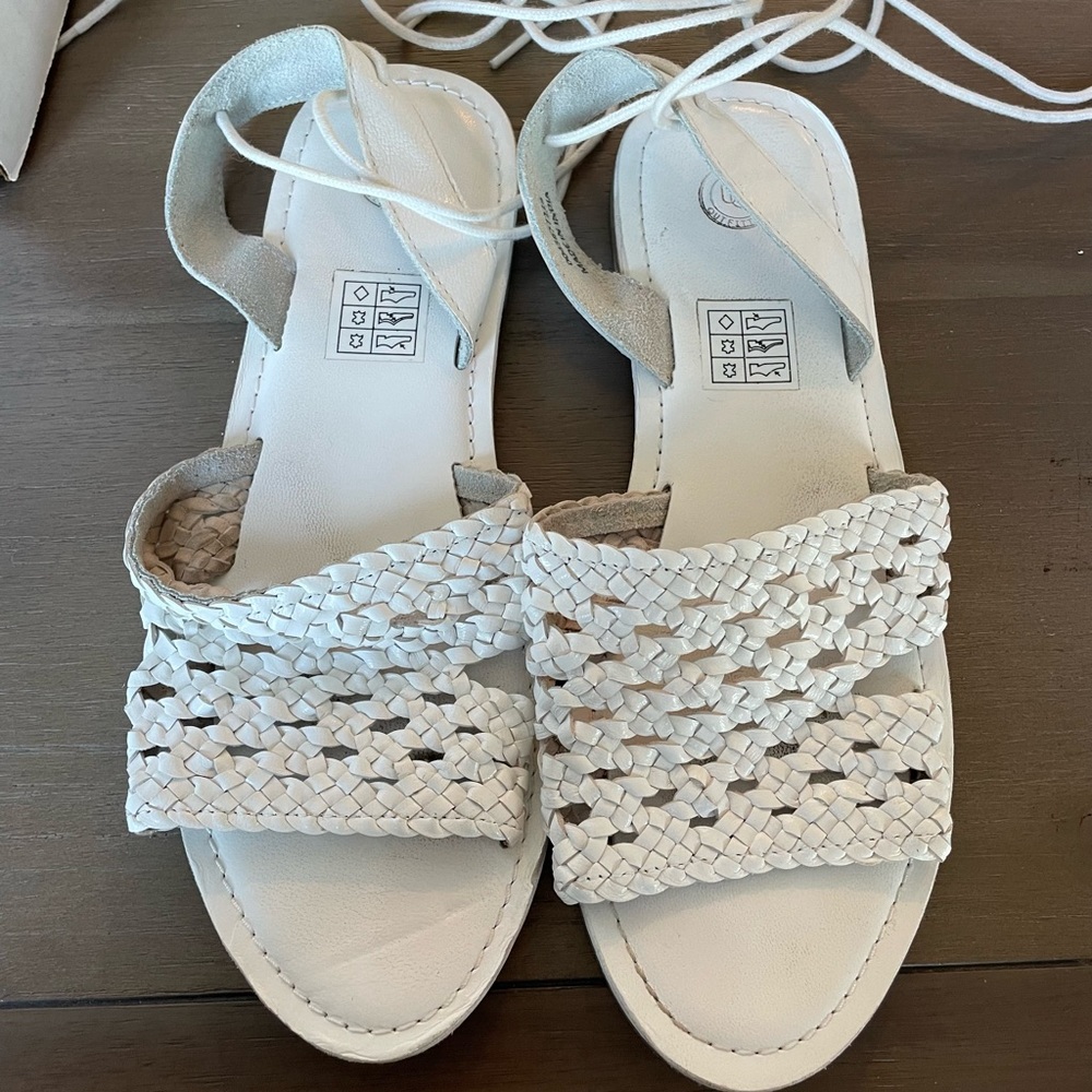 Urban Outfitters white sandals.